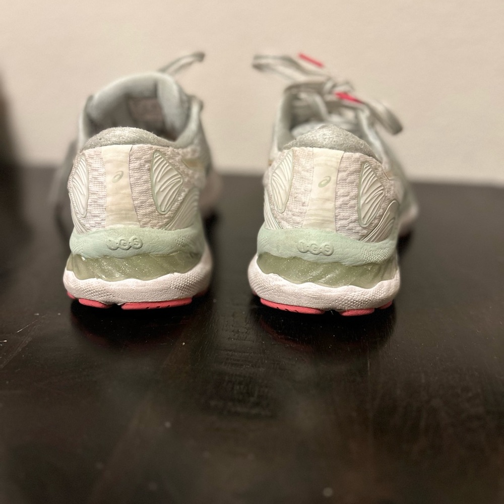 ASICS’s size 8 sneakers. Light mint green